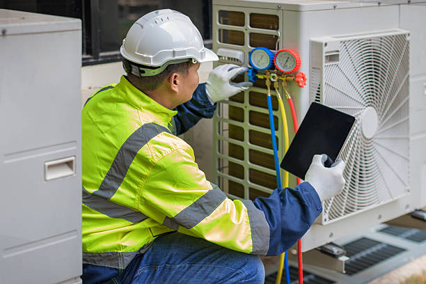 Professional Hvac technician working in Quogue, NY